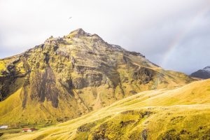 Yellow mountain and rainbow - off the beaten track in Iceland